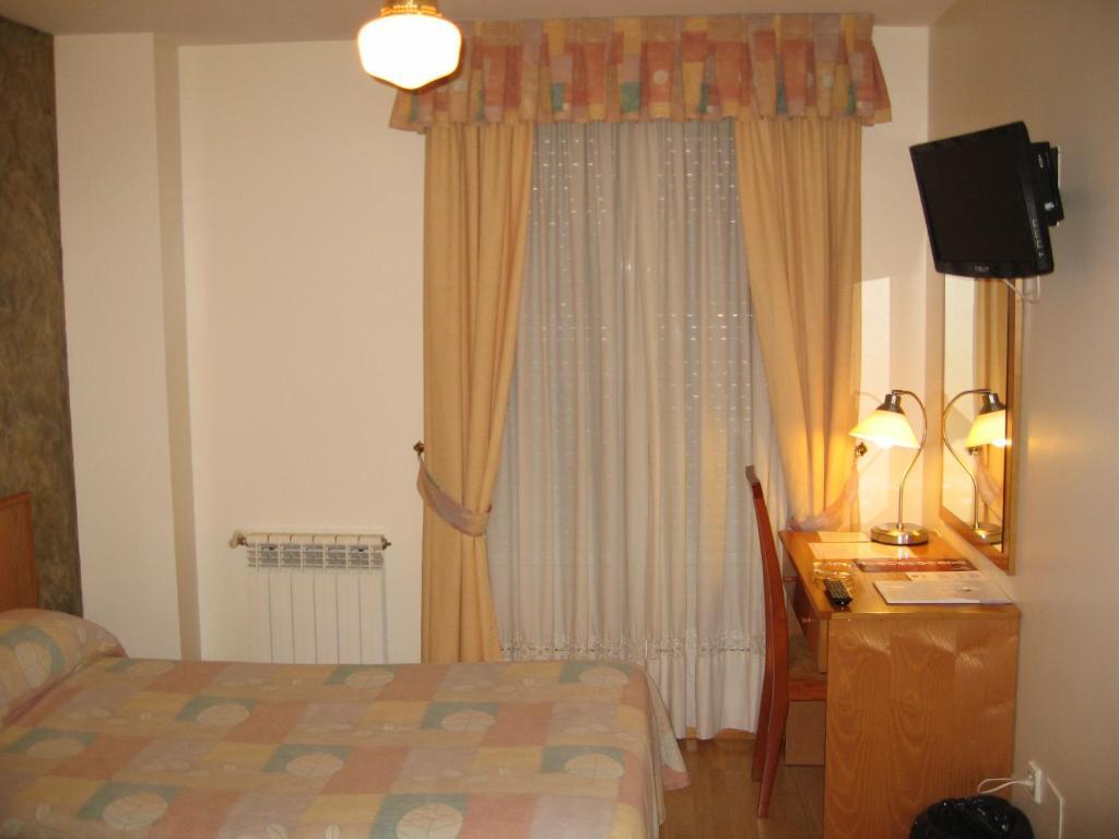Hotel Camargo Igollo Стая снимка
